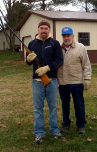 With a shotgun my Grandpa gave my Dad when he was nine; I inherited it when I reached that age.  This picture was taken right after Dad started chemo; we went target shooting in the woods for the last time together this day.
